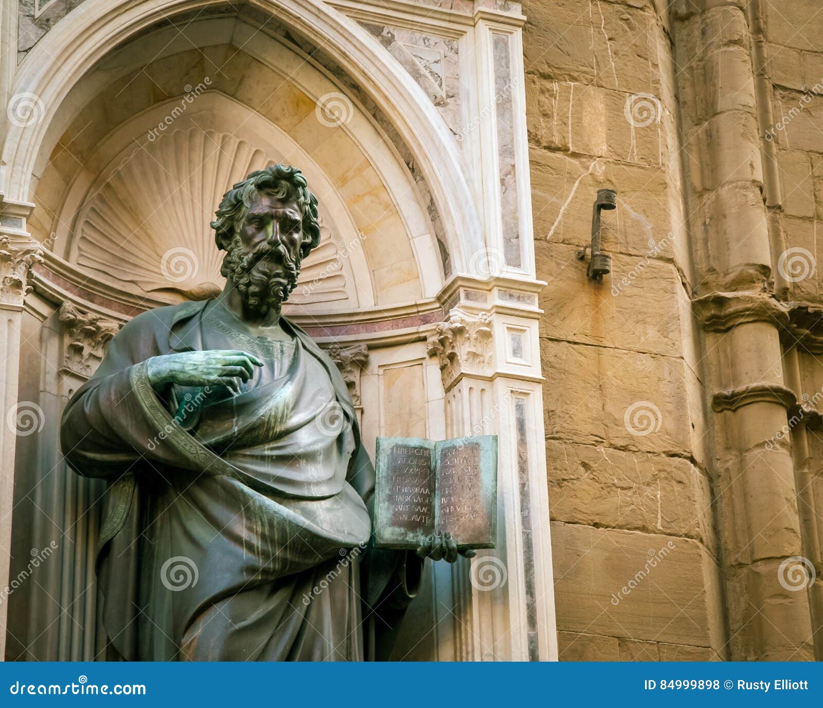 Statue holding a bible stock photo. Image of florence 84999898