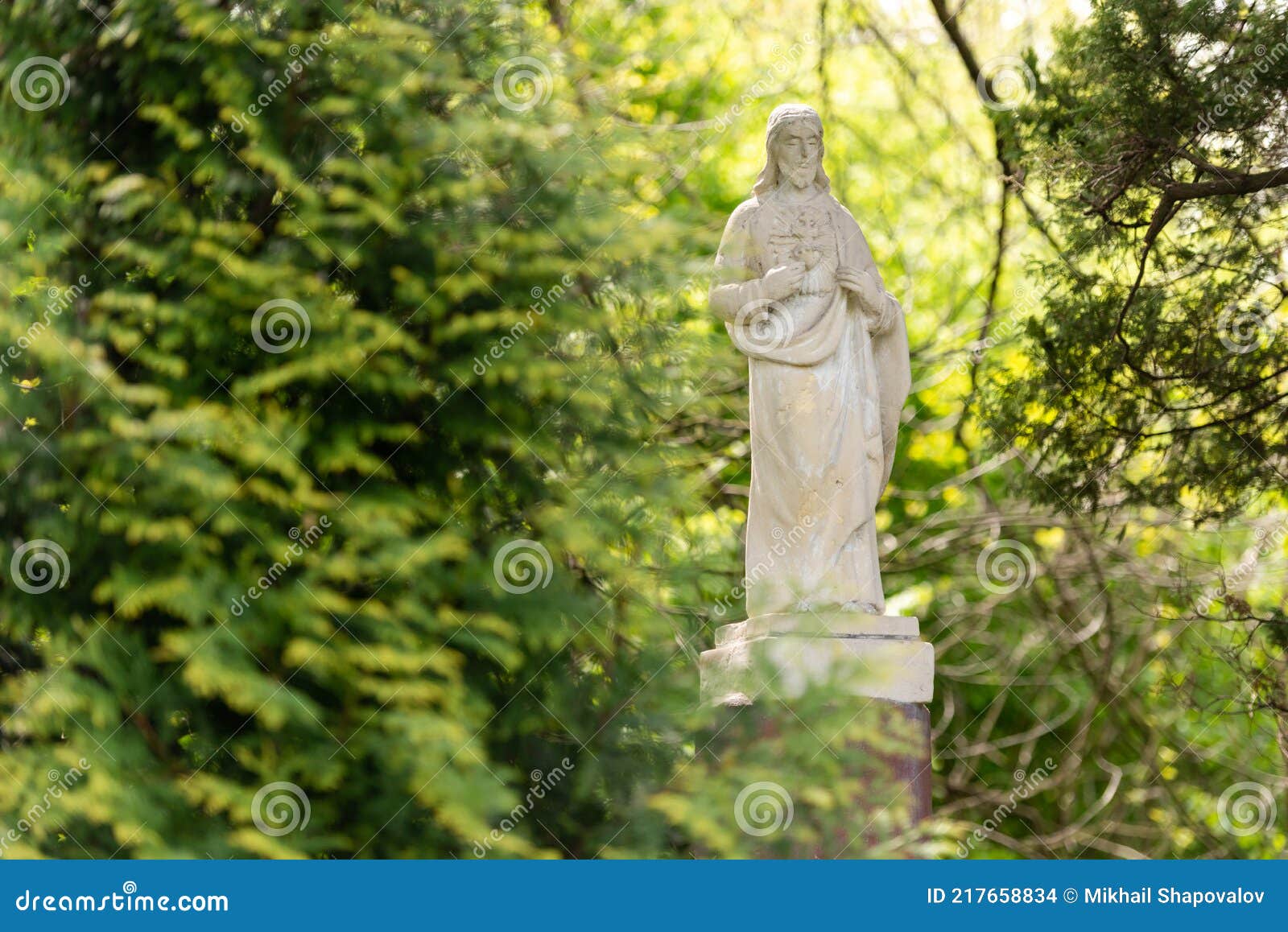 Statue of Jesus in the Forest Stock Photo Image of antique, green