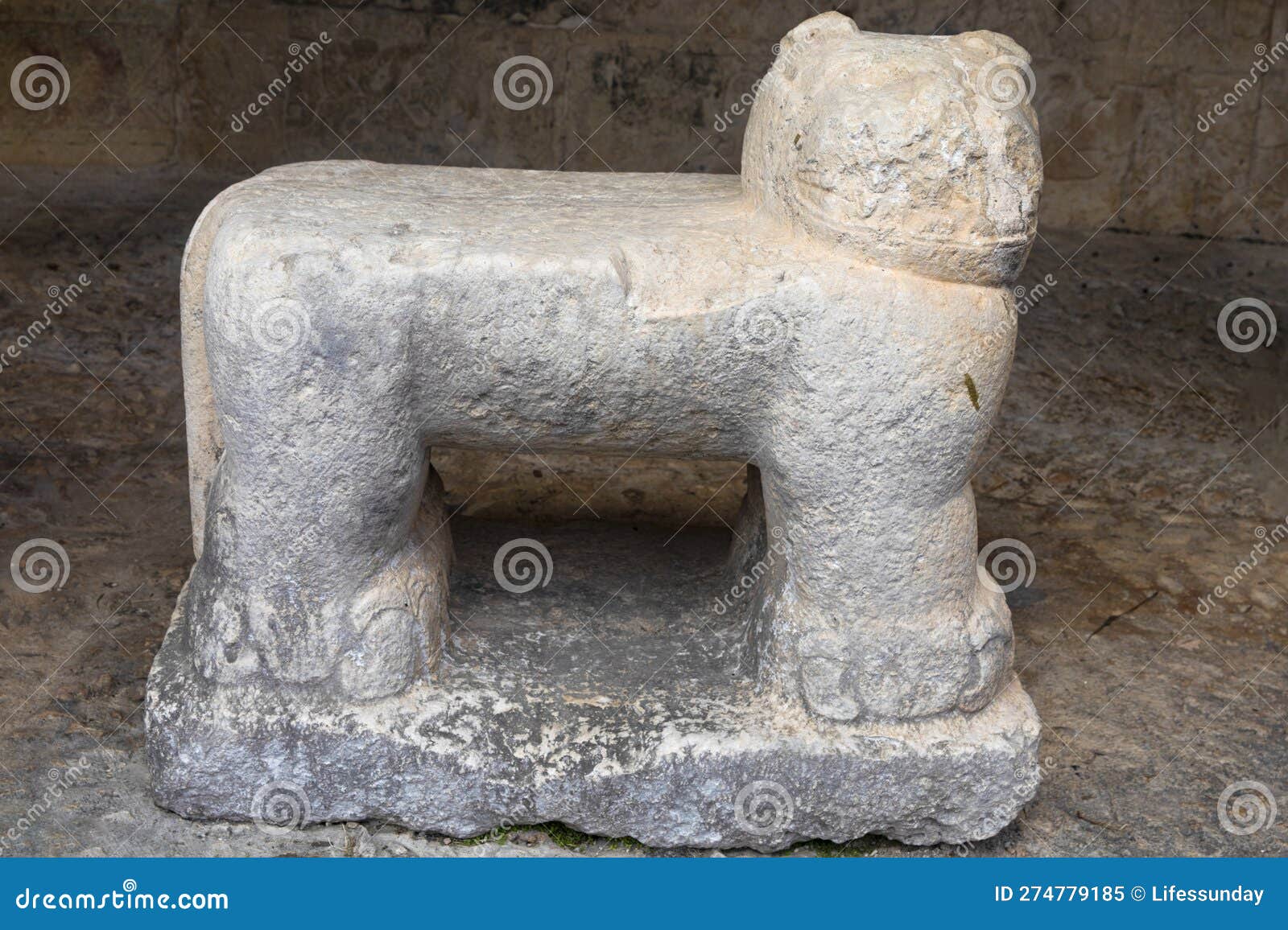 a statue known as a chacmool from the mayan ruins of chichen itza in the yucatan peninsula