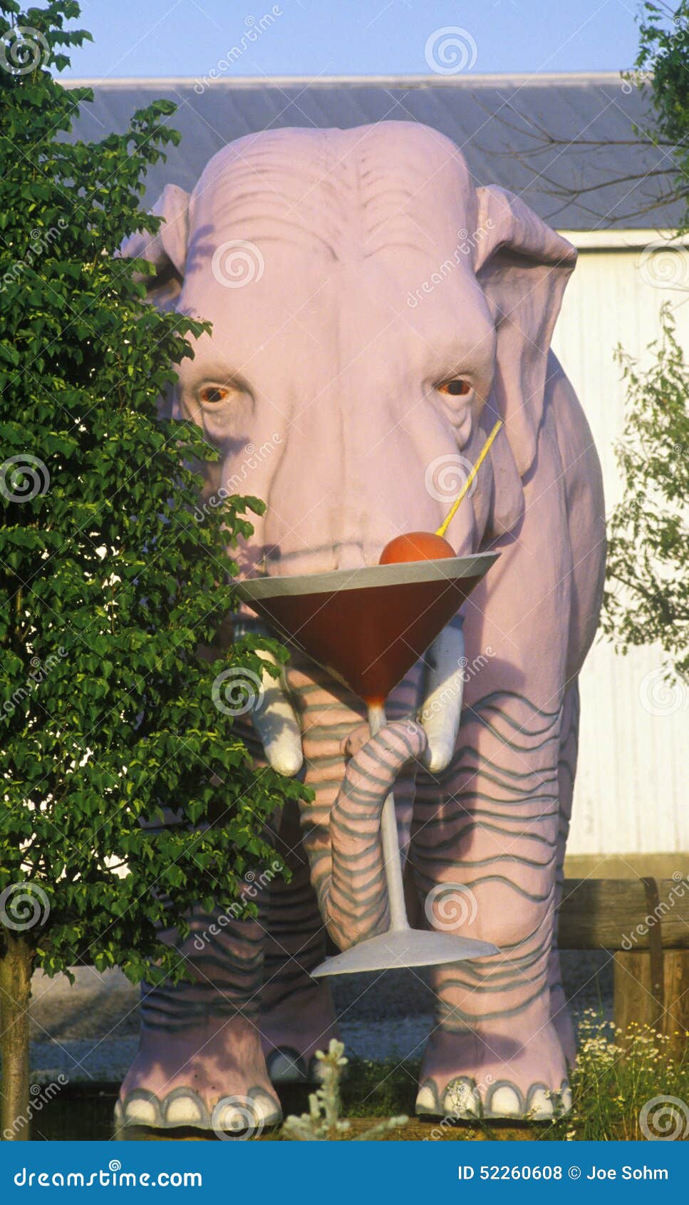 Statue of Large Pink Elephant with Martini in ID Editorial Stock Photo