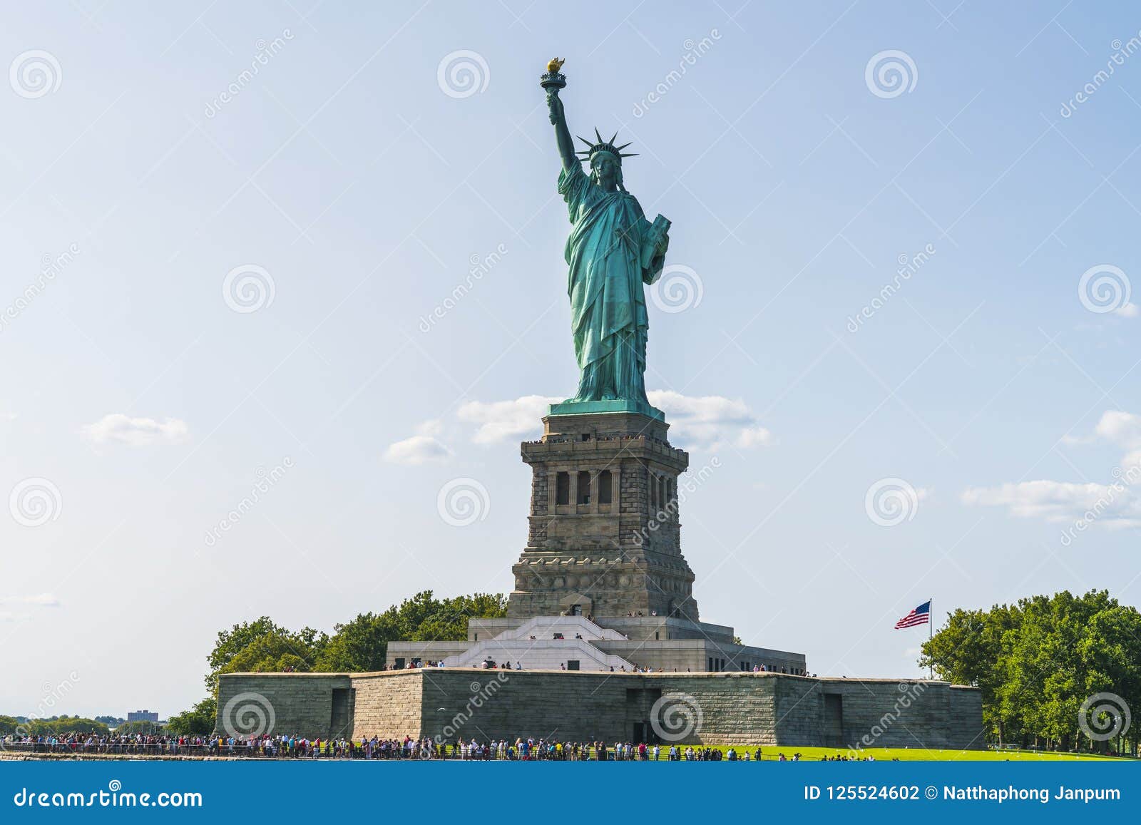 The Statue of Liberty with Blue Sky Background. Stock Photo Image of