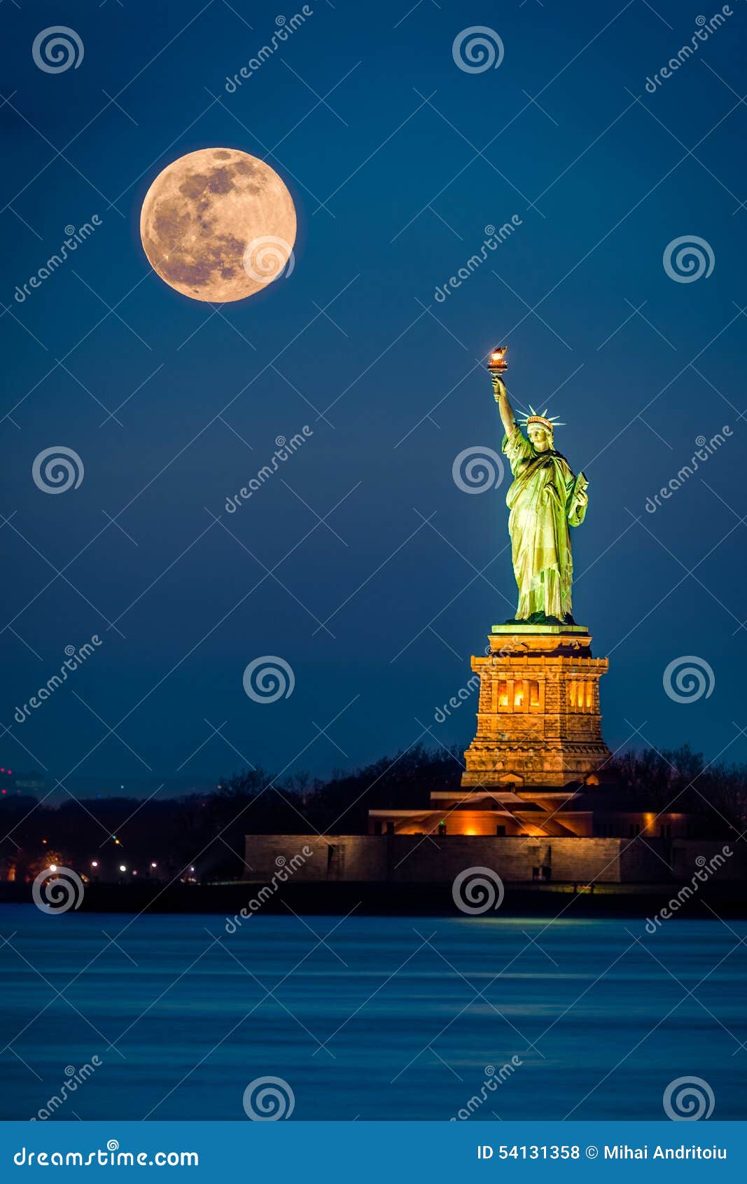statue of liberty and a rising supermoon