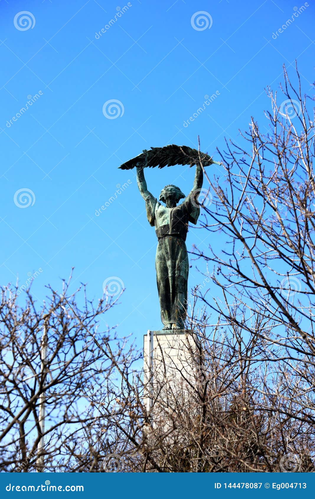 liberty statue on top of gellert mountain, budapest, hungary.