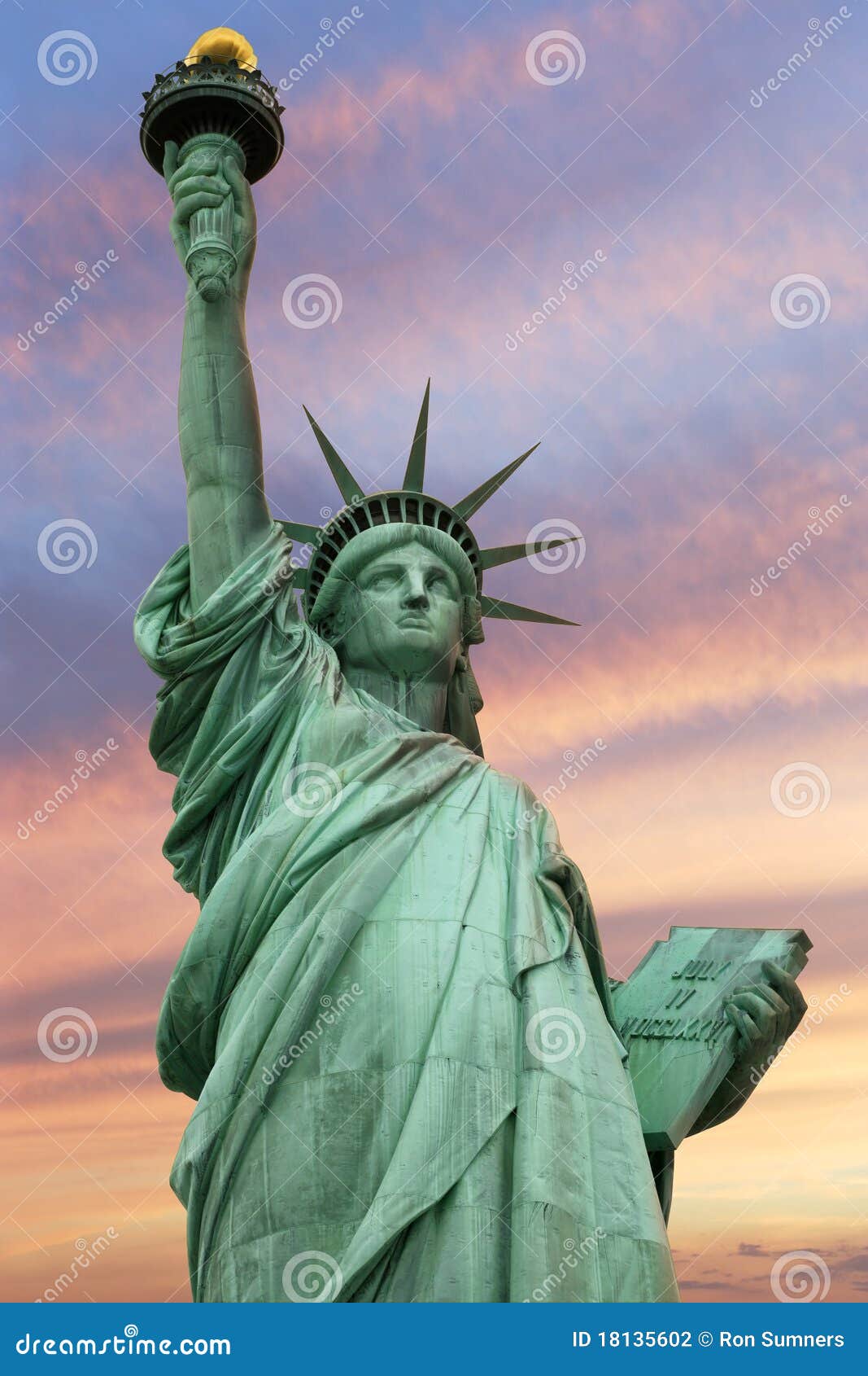 statue of liberty under a vivid sky