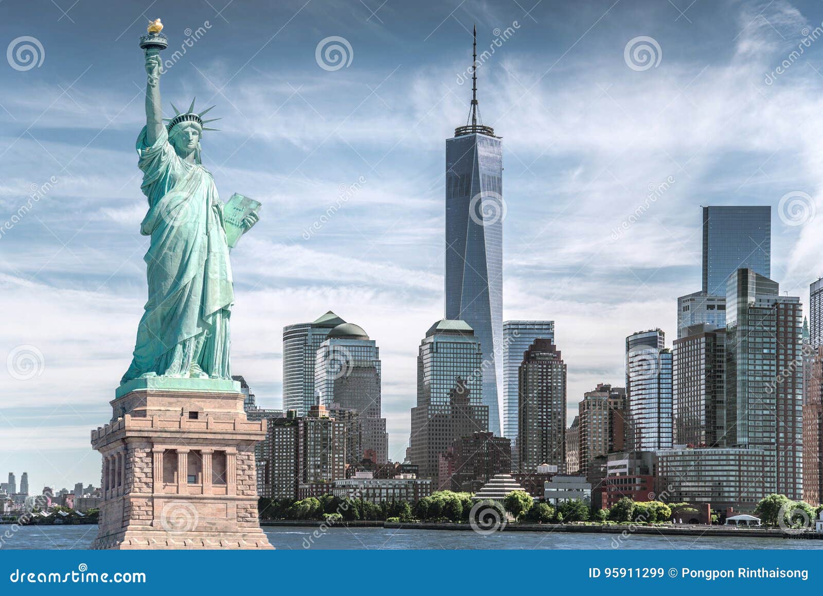the statue of liberty with world trade center background, landmarks of new york city