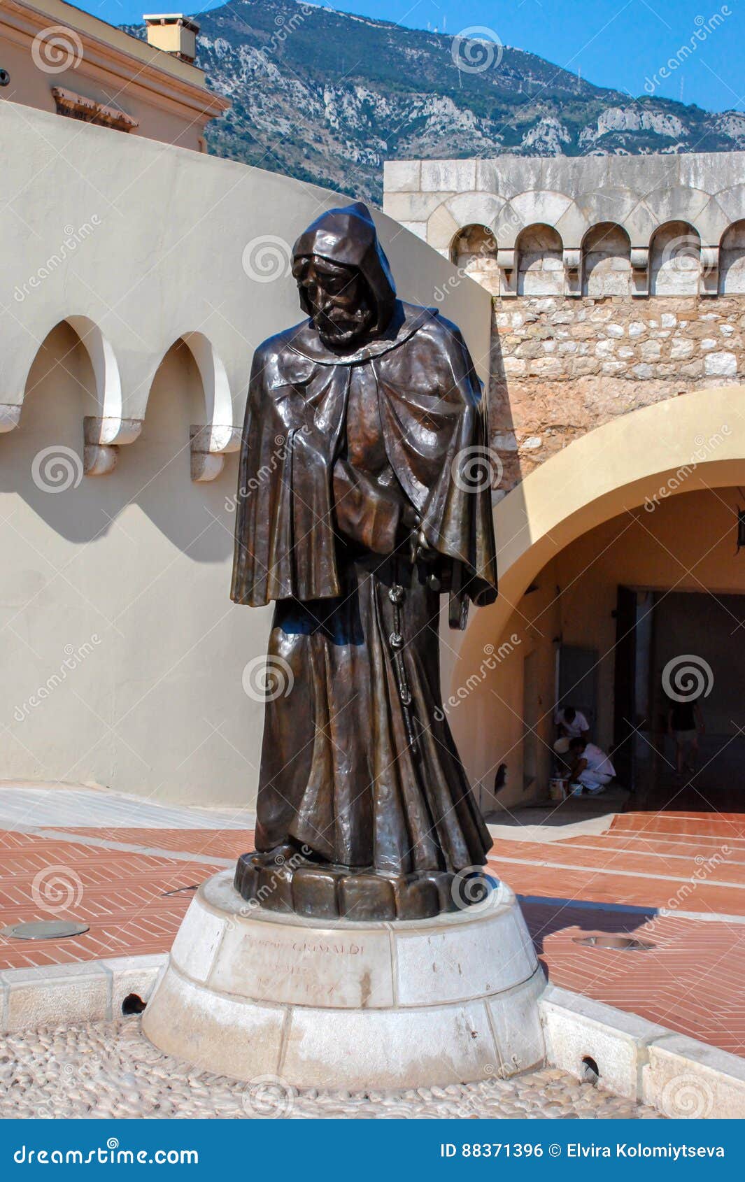 statue of the monk in front of the royal palace in the state mon