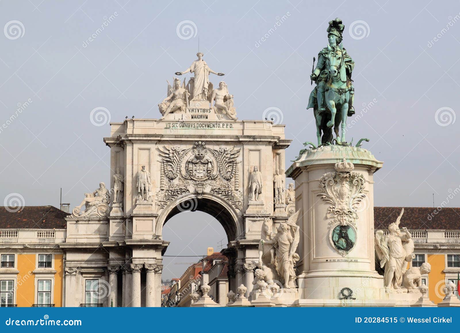statue and triumphal arch in lisbon, portugal