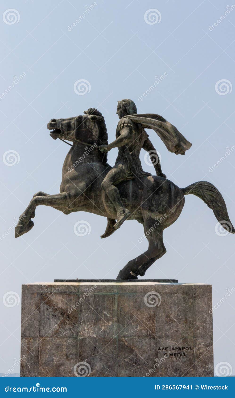 A Statue of Two Men on Horseback Riding on a Stone Surface Stock Image
