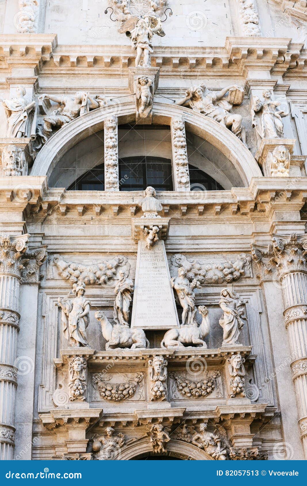 statue of vincenzo fini on facade church