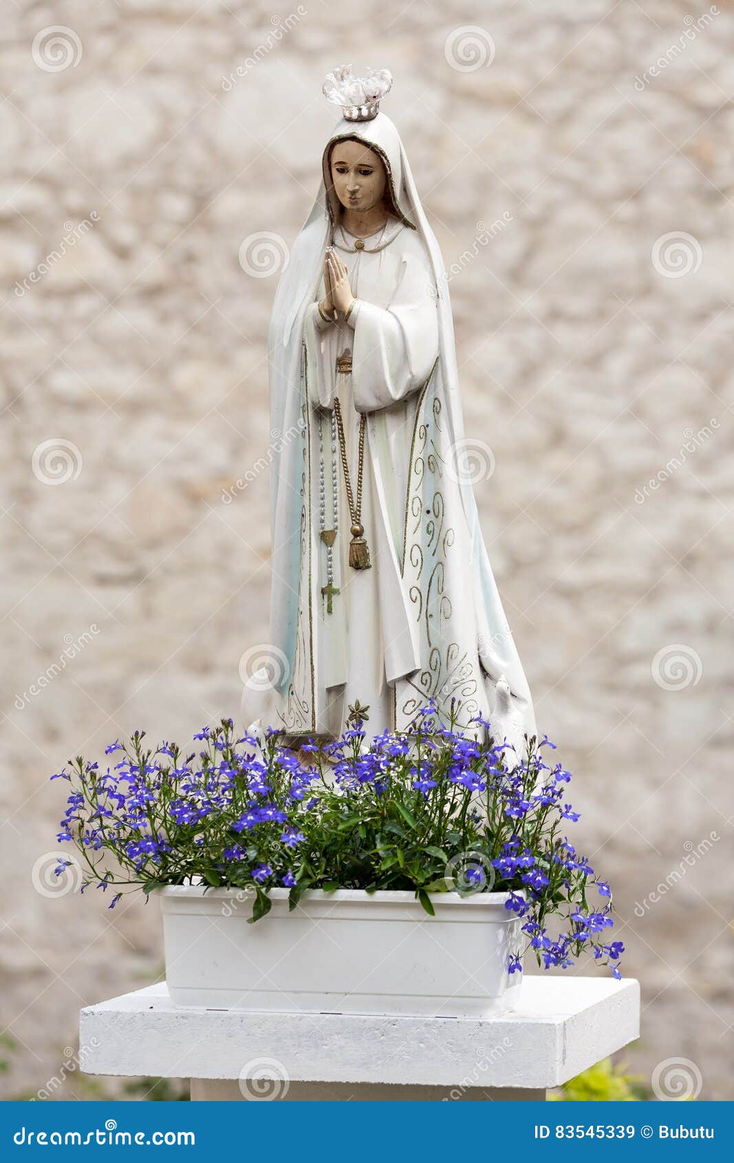 Statue of Virgin Mary with Flowers Stock Image - Image of color ...