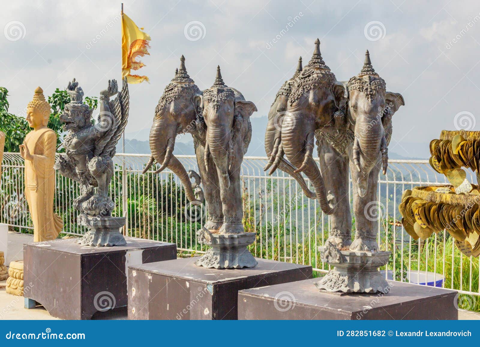 Statues of Buddha, Elephants and Mythical Creature with Wings in the ...