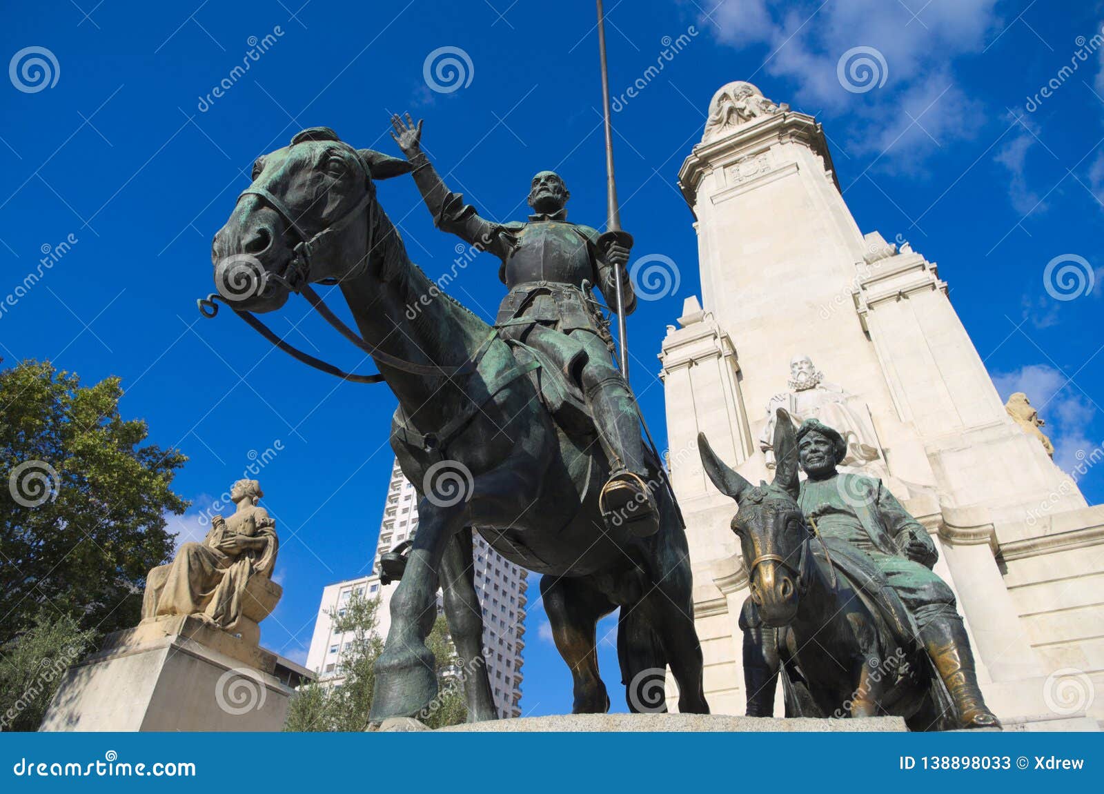 statues of don quixote and sancho panza at the plaza de espana in madrid.