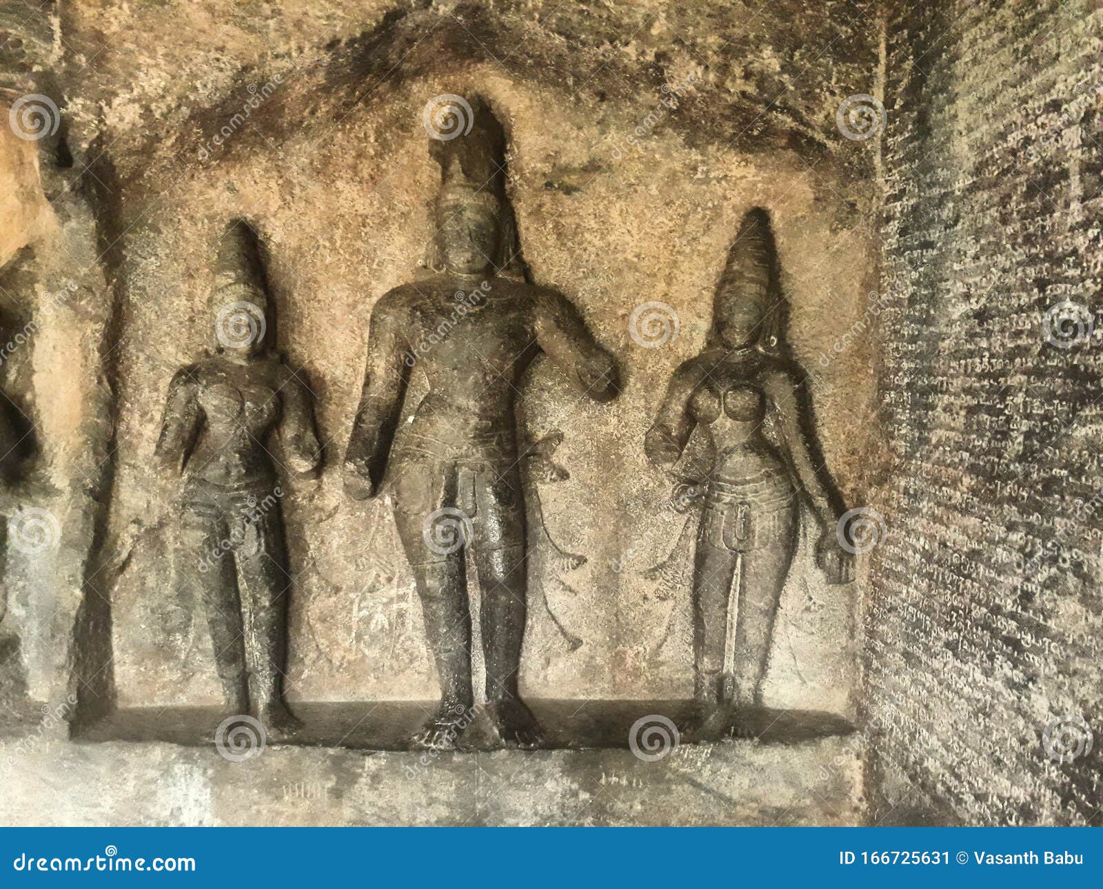 statues engraved in a temple in tamil nadu india. the temle nam is rock cut cave temple