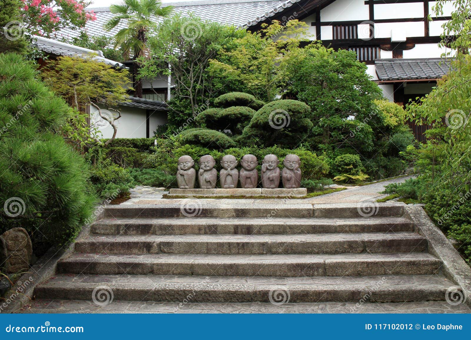 The Statues Of Little Buddhas At A Garden Stock Photo Image Of