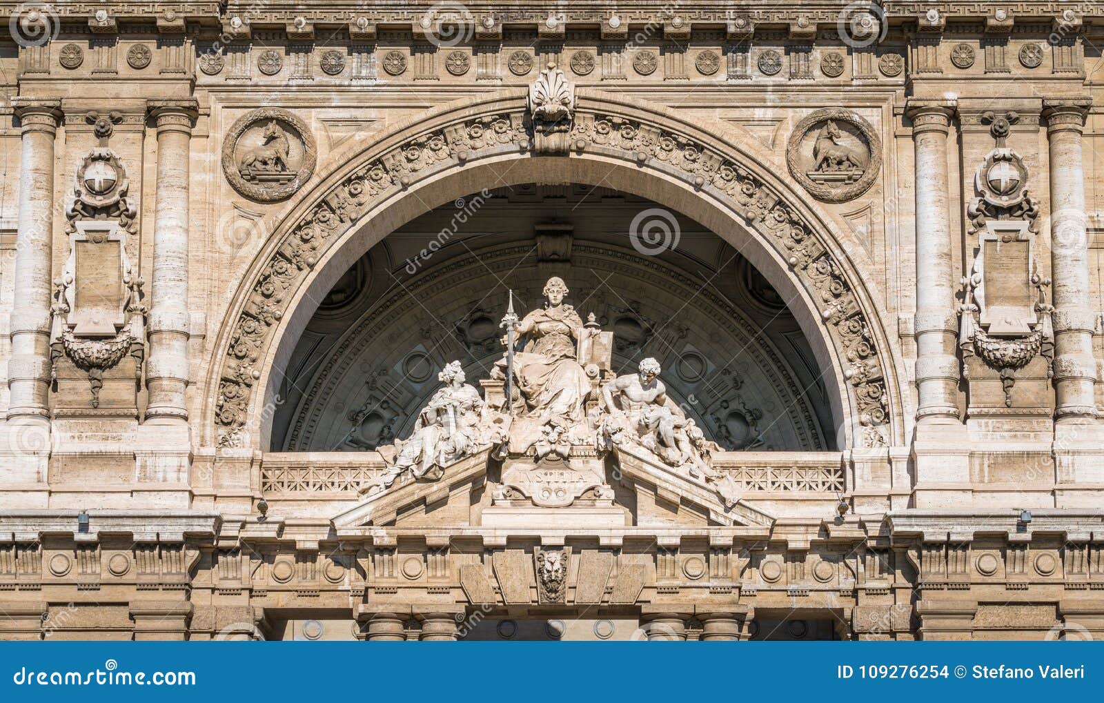 statues on the main facade of the justice palace in rome, italy.