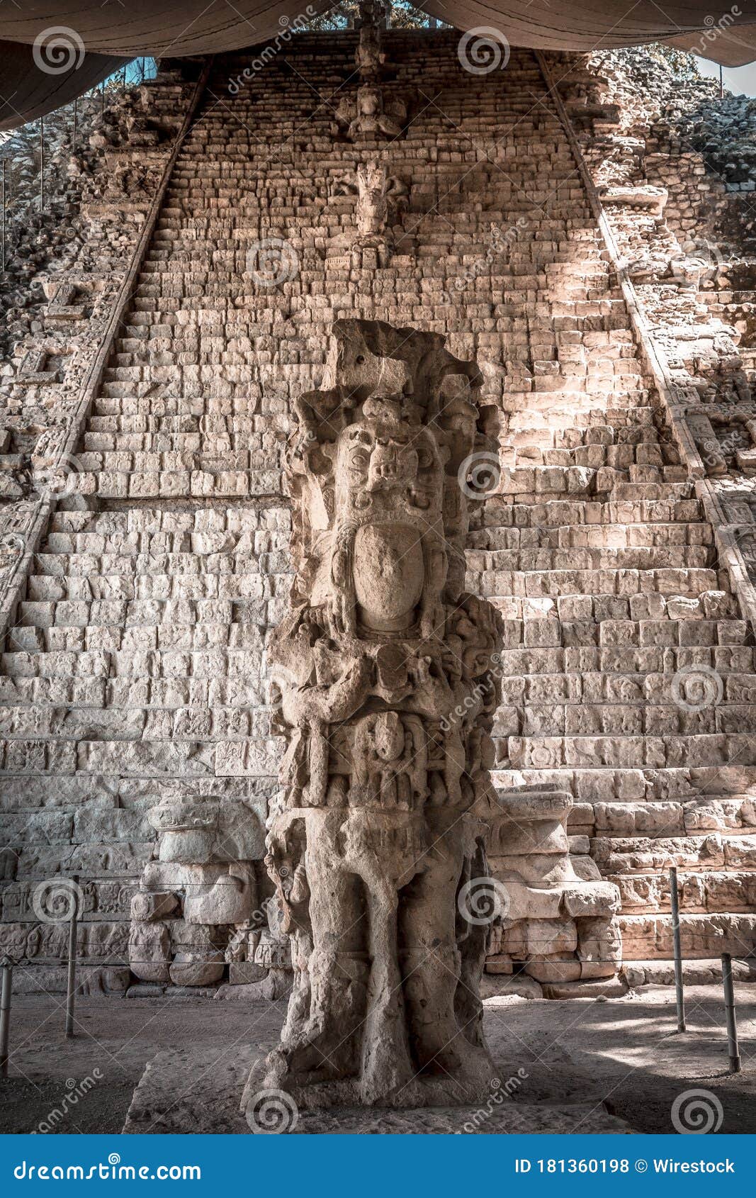 Statues on the Stairs of the Mayan Ruins in Honduras Stock Photo