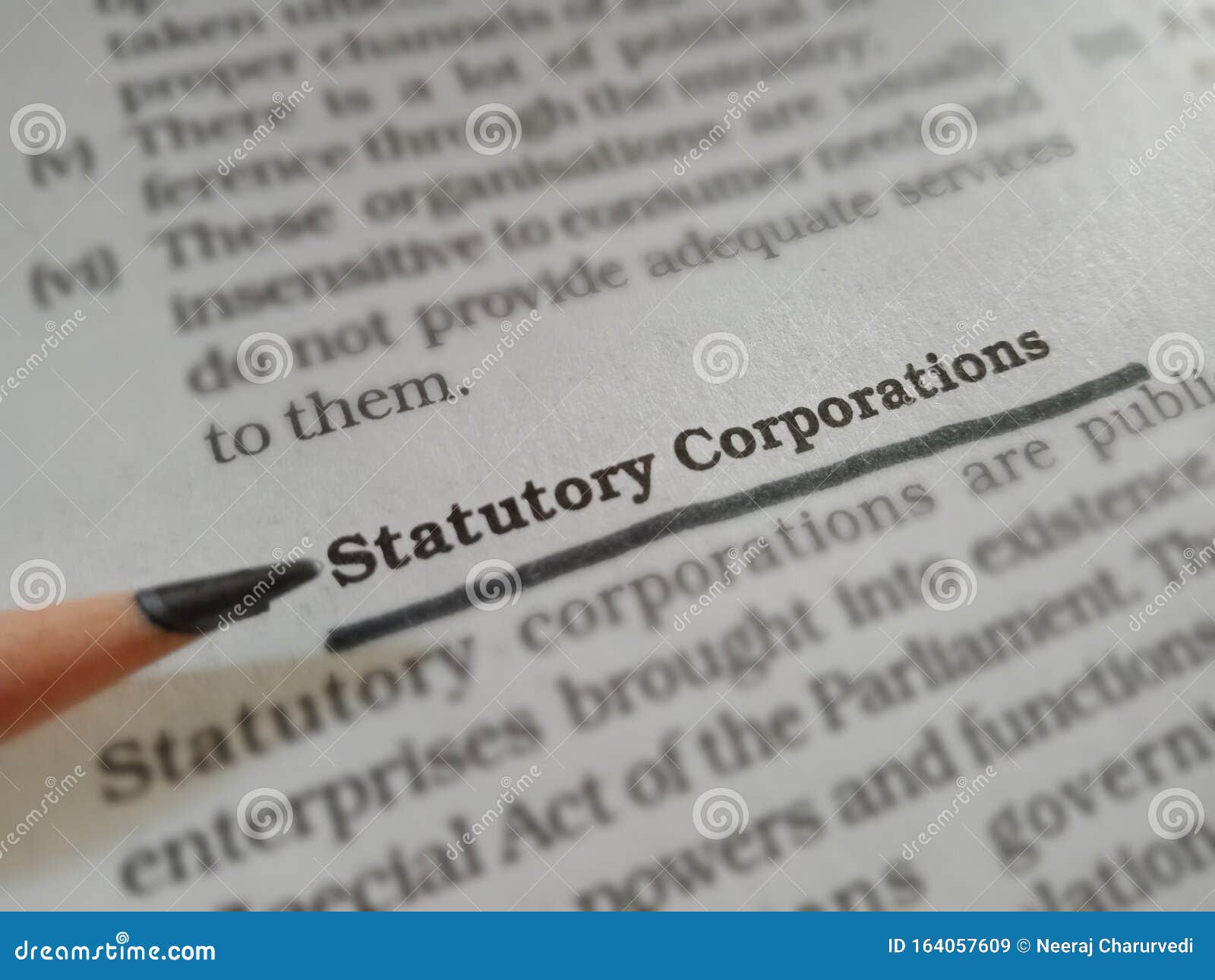 Statutory Corporations Words Displaying on Book Article Underlined Text