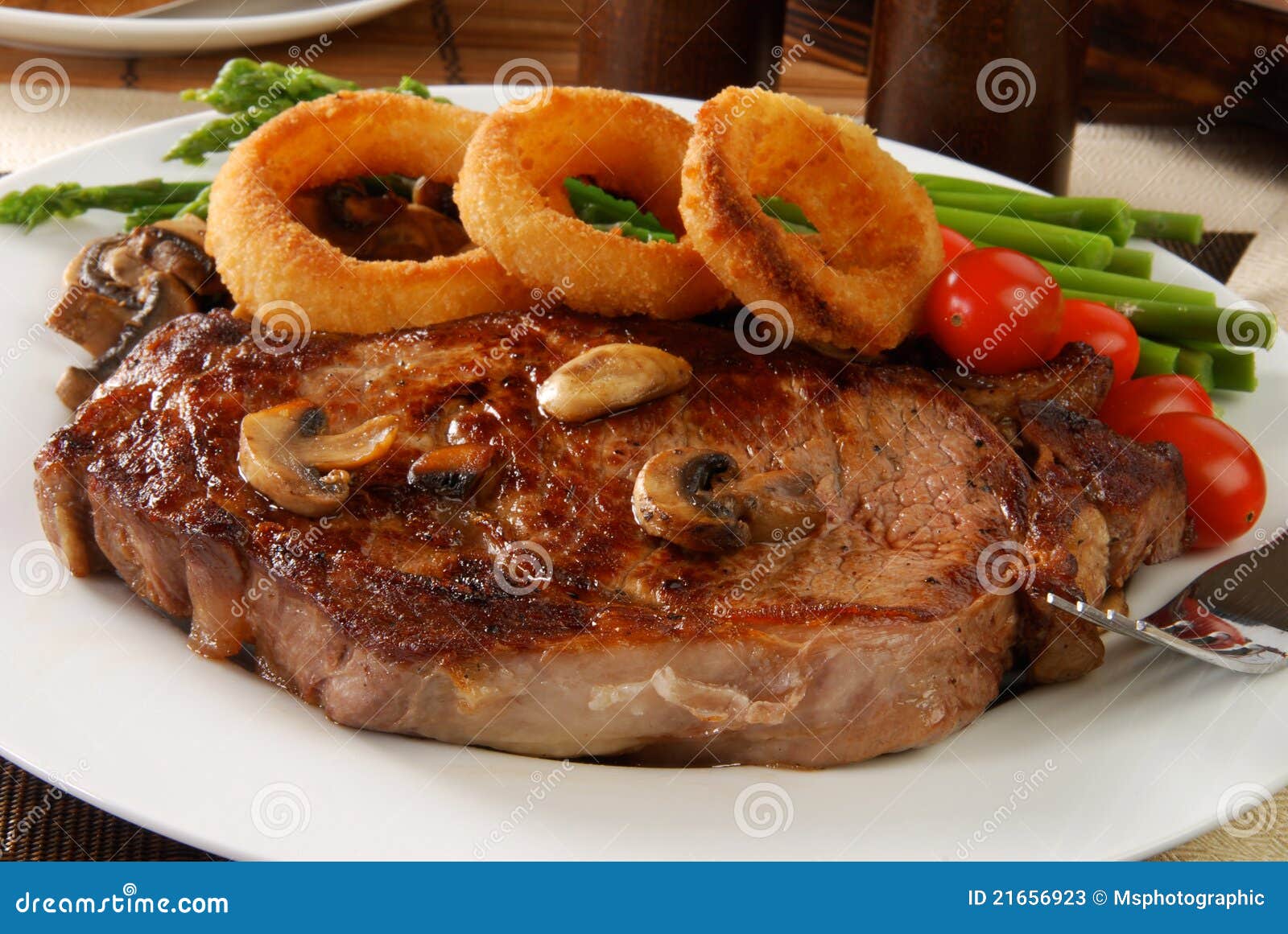 Steak and onion rings stock image. Image of meat, rings 21656923