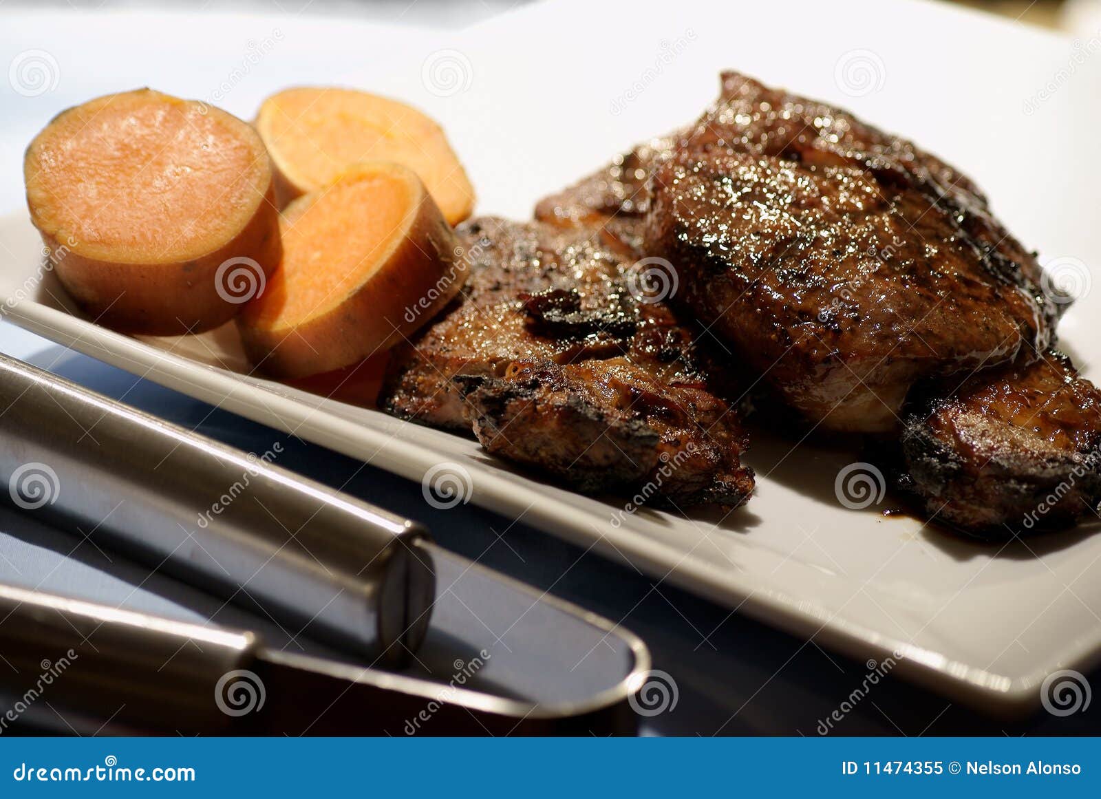 Steak and Yams for Dinner stock image. Image of boiled 11474355
