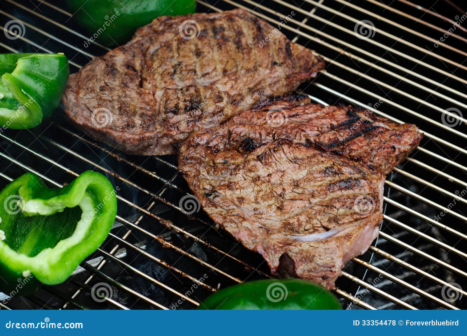 Steaks with Green Peppers on a Grill Stock Photo Image of juicy