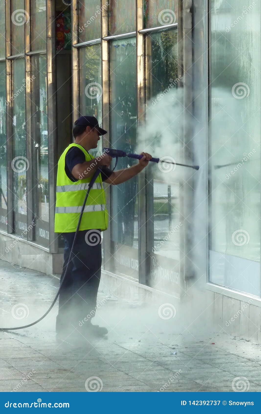 Steam Cleaning Windows with Pressure Editorial Photography - Image