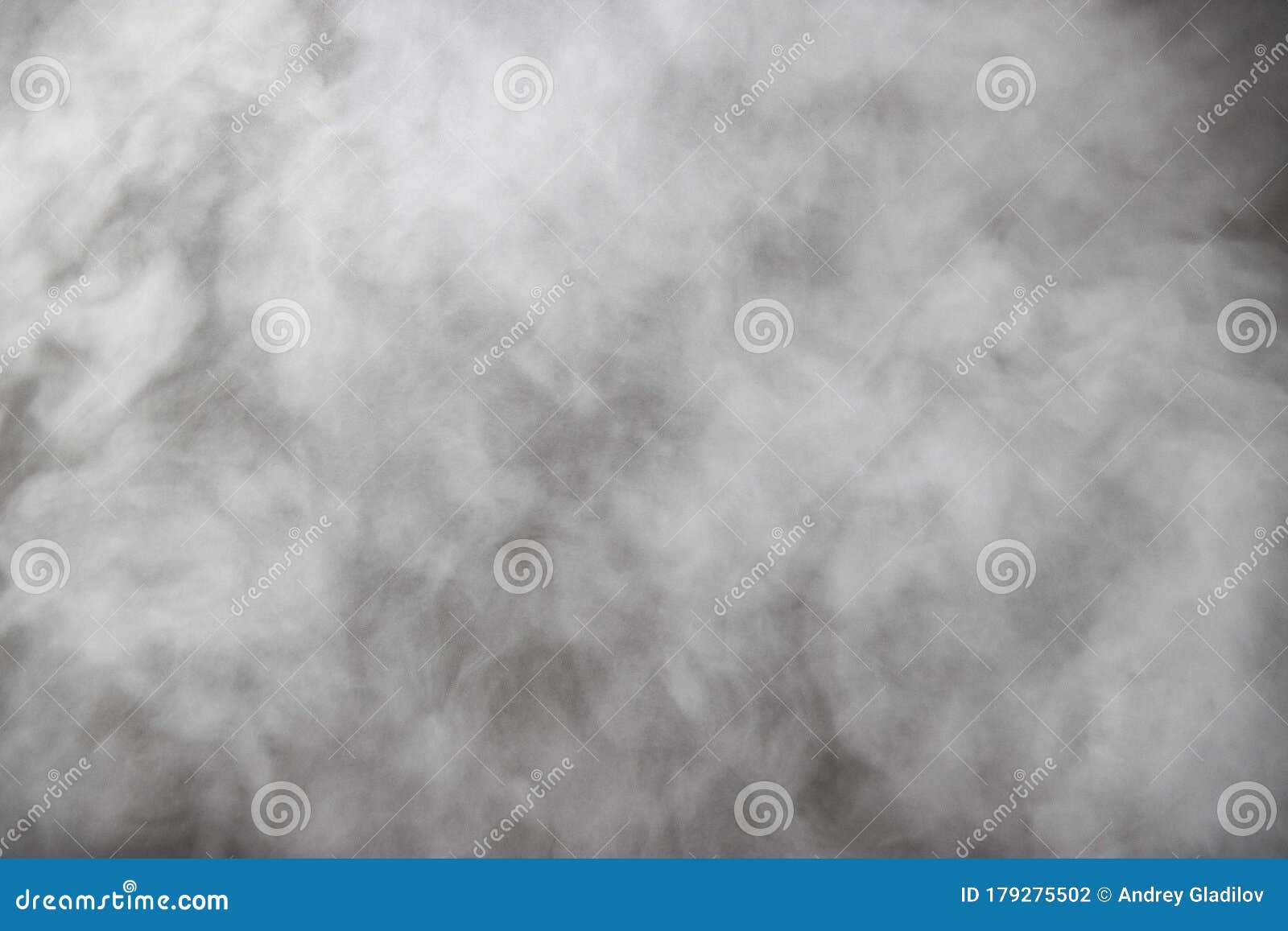 Steam Evaporating Clouds of Steam on a Dark Background. Stock Photo