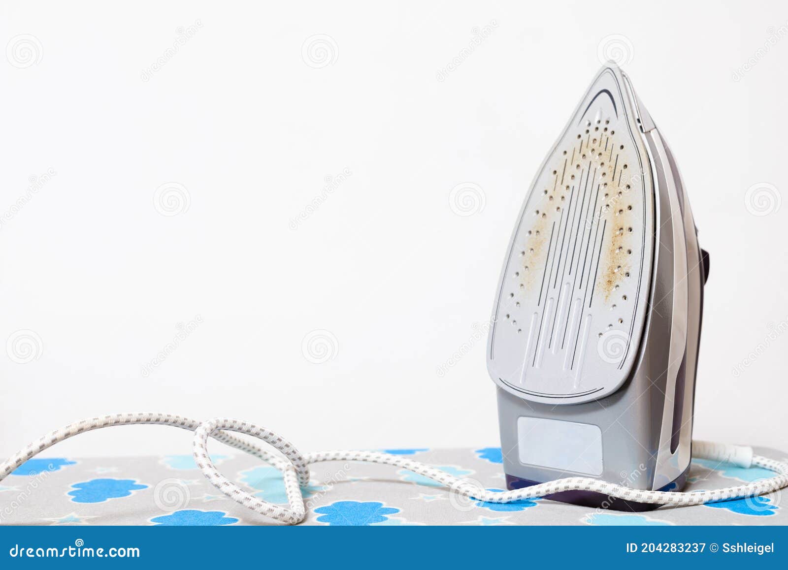 Dirty Ironing System With Clogged Steam Holes. Lateral View Stock