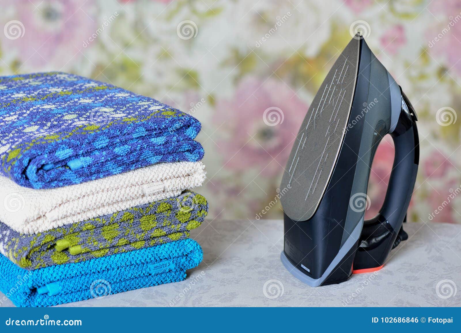 Steam Iron on an Ironing Board Stock Photo Image of fabric, board