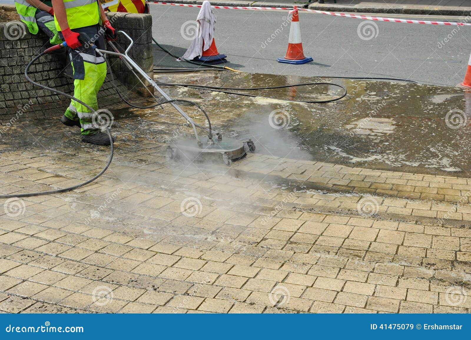 steam jet wash cleaner on the sidwalk