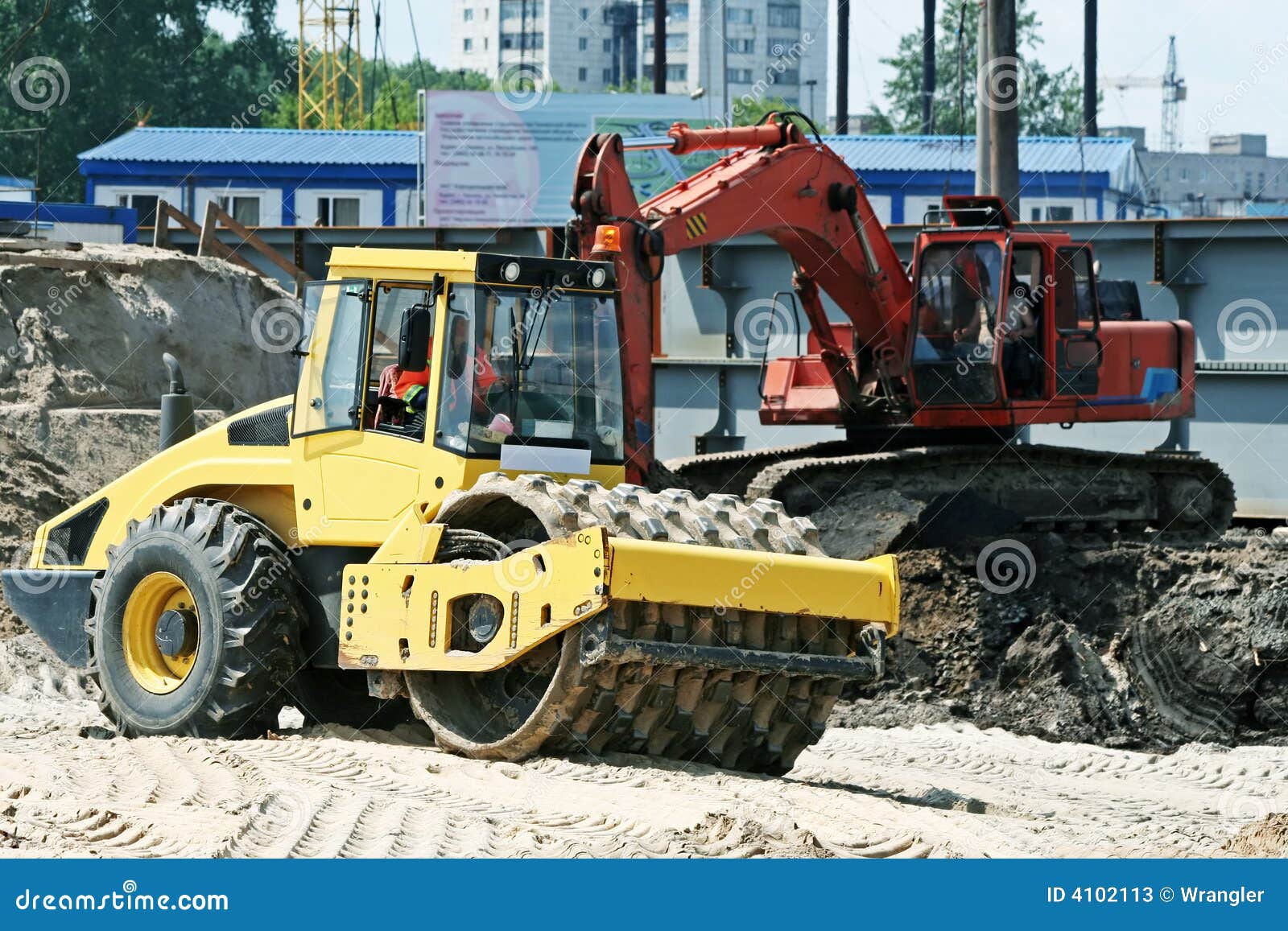 Steam Roller and Excavator on Construction Site Stock Image Image of
