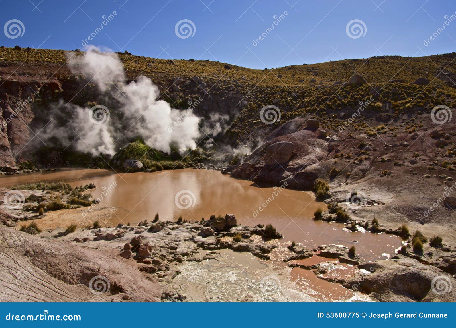 steam venting from mud pools in atacama desert