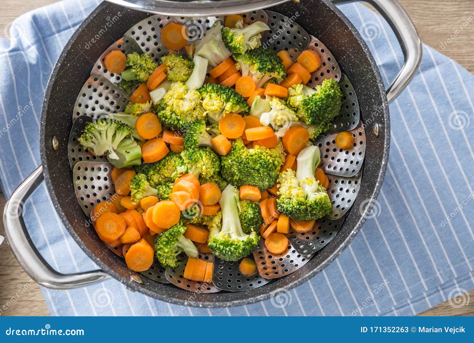 Steamed Mixed Vegetable in Black Pot. Healthy Vegetable Concept Stock