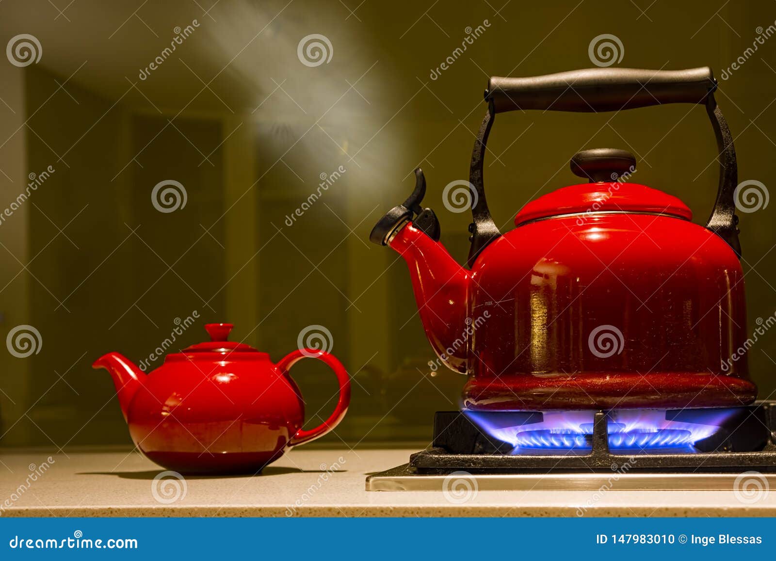 boiling red kettle with red teapot