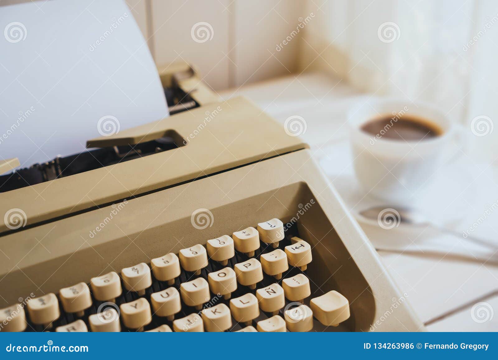Vintage Looking Coffee and Typing Machine on a Desk Stock Photo Image