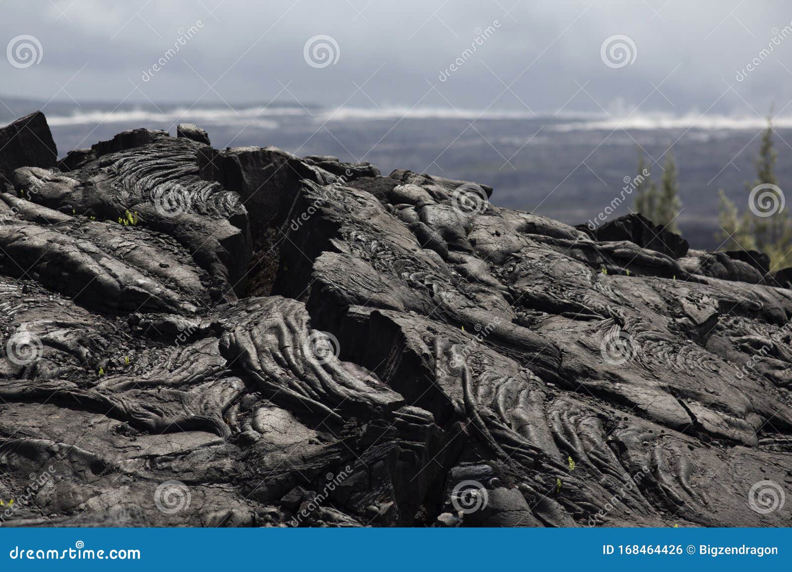 Steaming Volcanic Vents and a Pile of Cracked Lava Rock Stock Photo ...