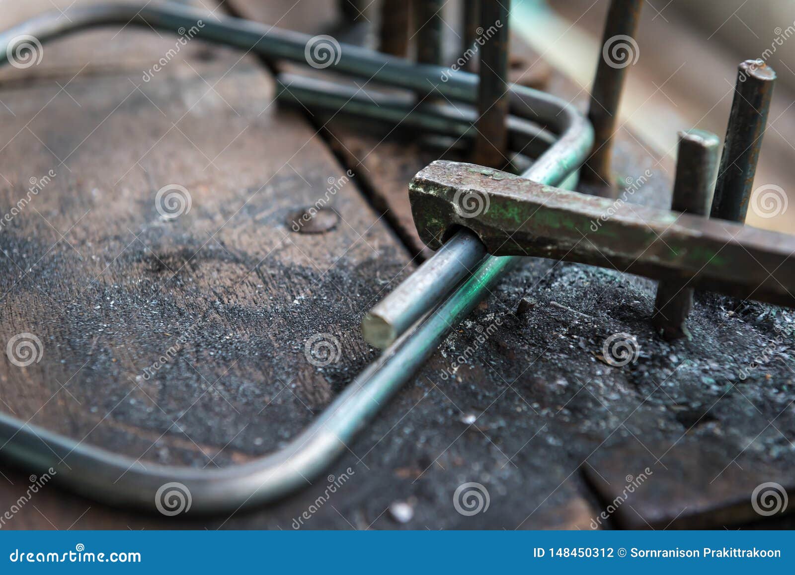 Steel bar bending stock photo. Image of hardware, action 148450312
