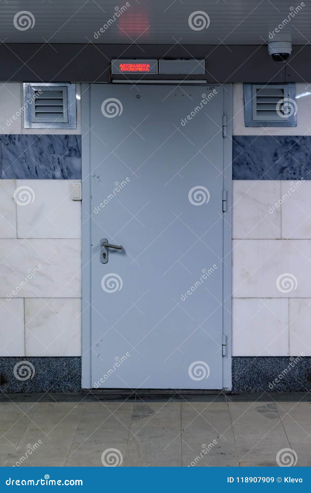 The Steel Gray Door In The Subway Is Equipped With Access Control