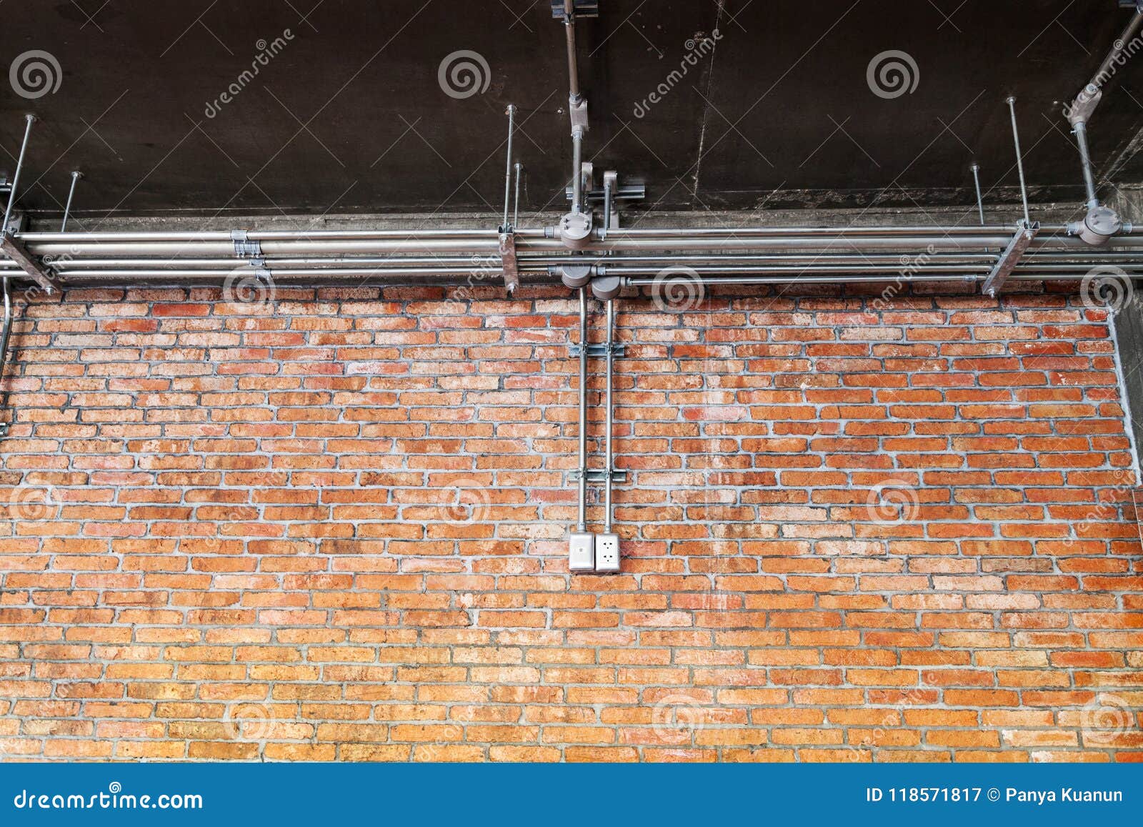 Brick Wall Electrical Conduit Stock Photo 1256096542