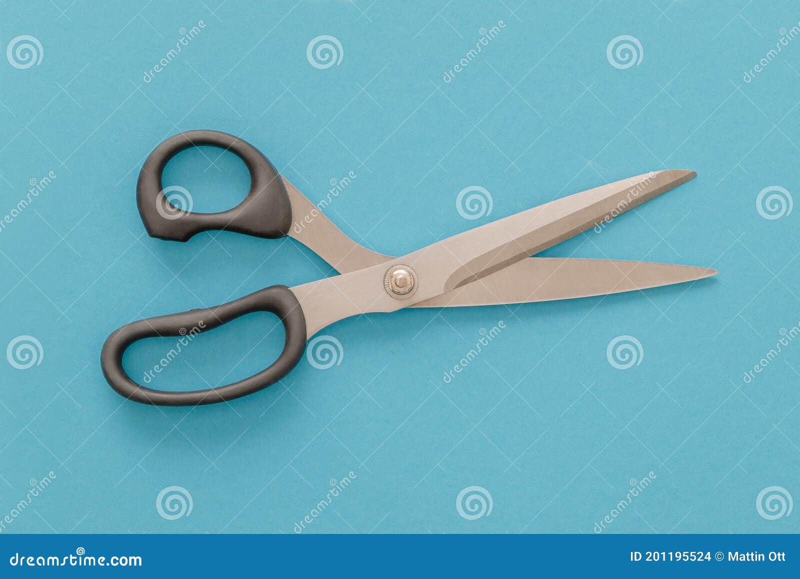 Steel Scissors Utensil for Crafting Isolated in Blue Stock Photo