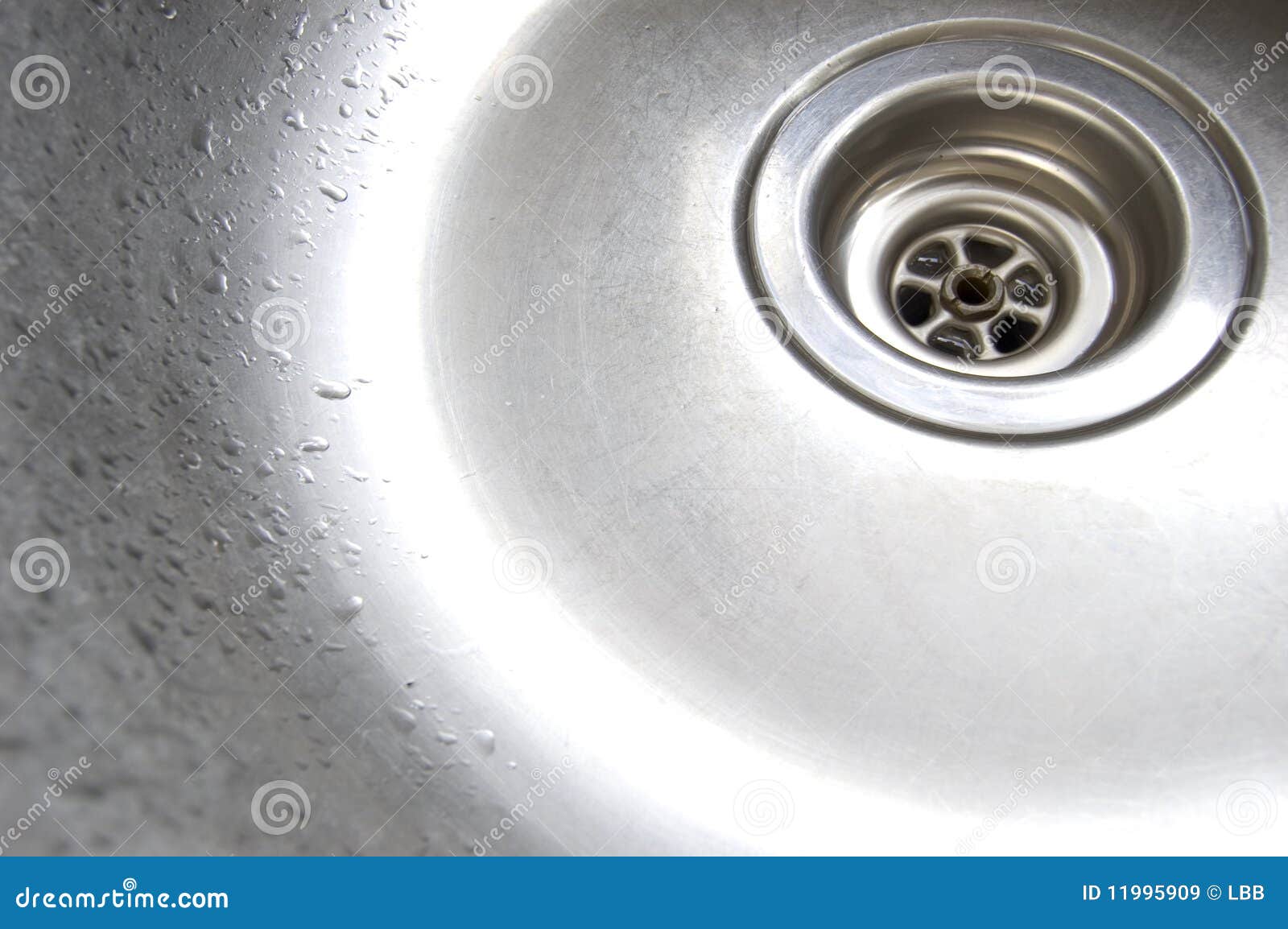 Steel_sink_plughole_wet stock image. Image of steel, washing 11995909