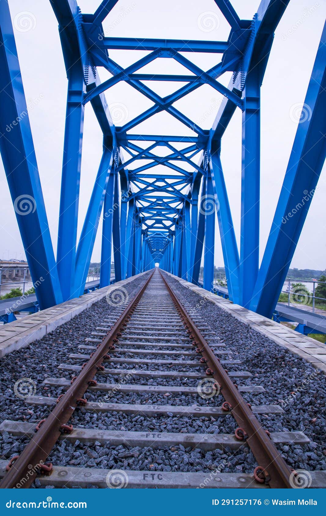 Steel Structure Rail Bridge Over the River in Bangladesh Stock Photo