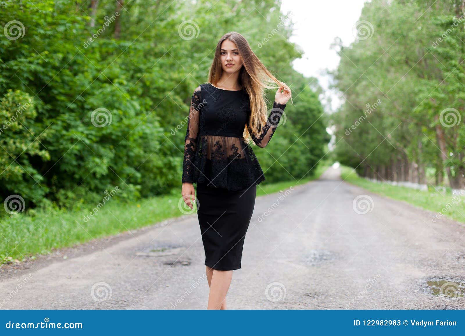 Steep Slender Ukrainian Woman on the Asphalt Old Road Stock Image ...