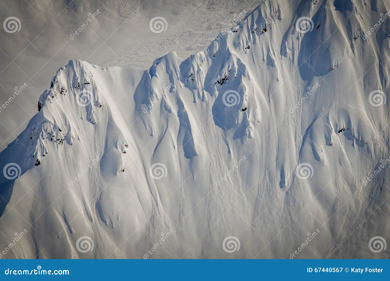 steep snow covered ridgeline, alaska