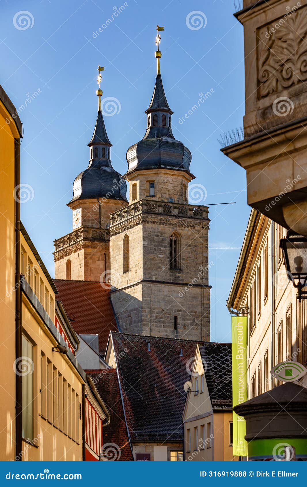 the steeples of the stadtkirche in bayreuth old town