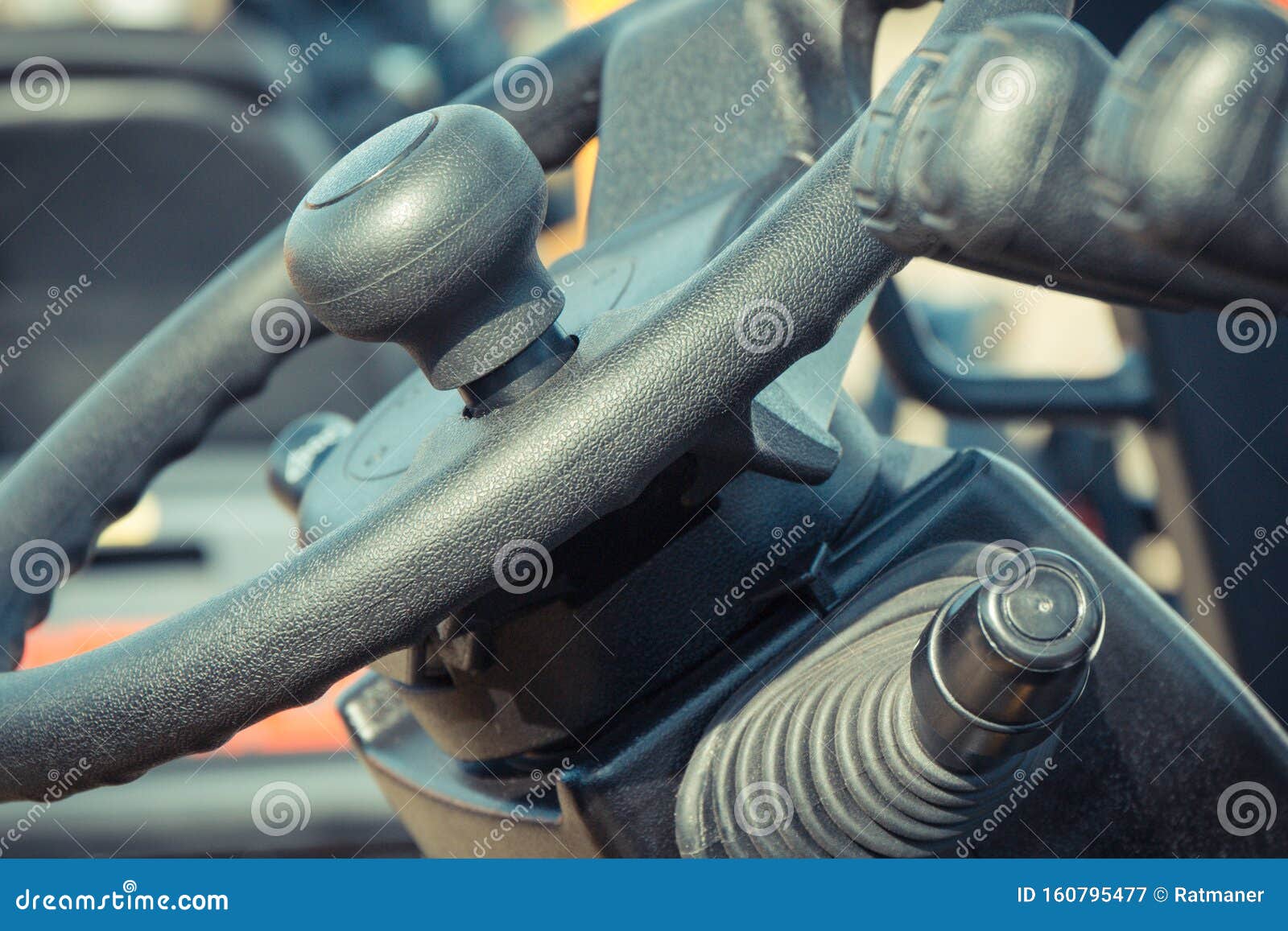 Steering Wheel and Operating Control Levers in Loader Machine Stock