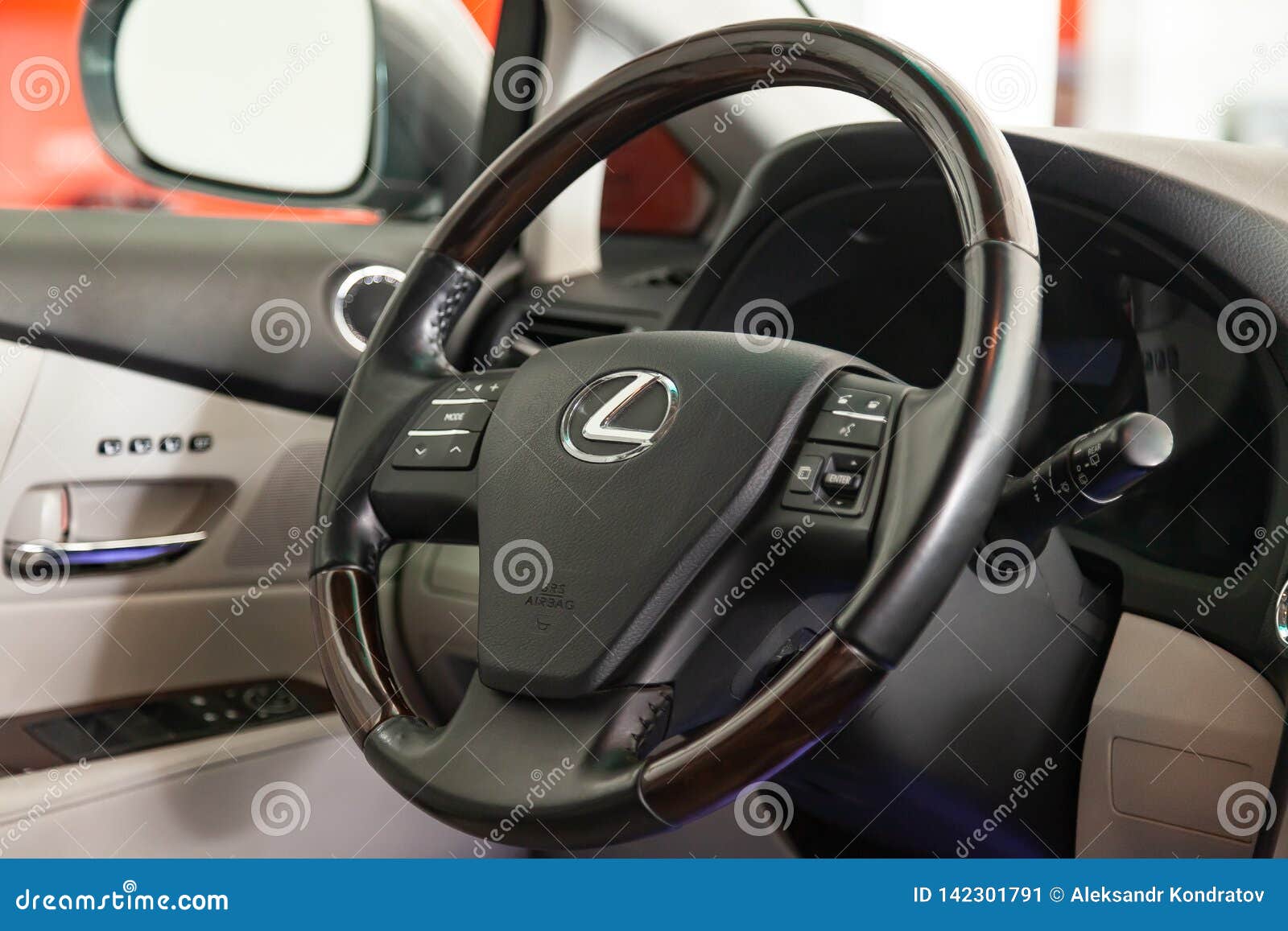 Steering Wheel With Parts Of Wood And Chrome Plated Details