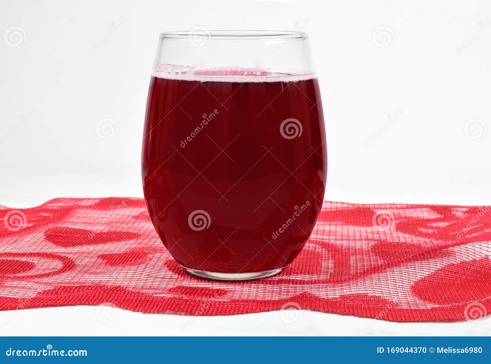 stemless wineglass valentine mockup with sparkling red wine
