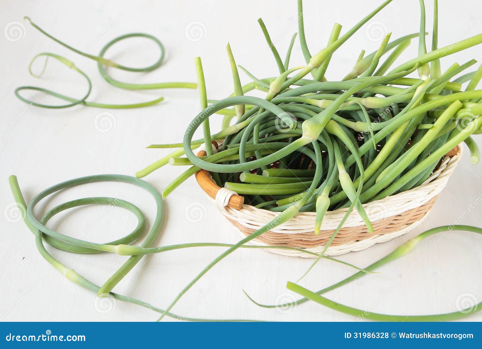 Stems of garlic in basket stock photo. Image of vegetable 31986328