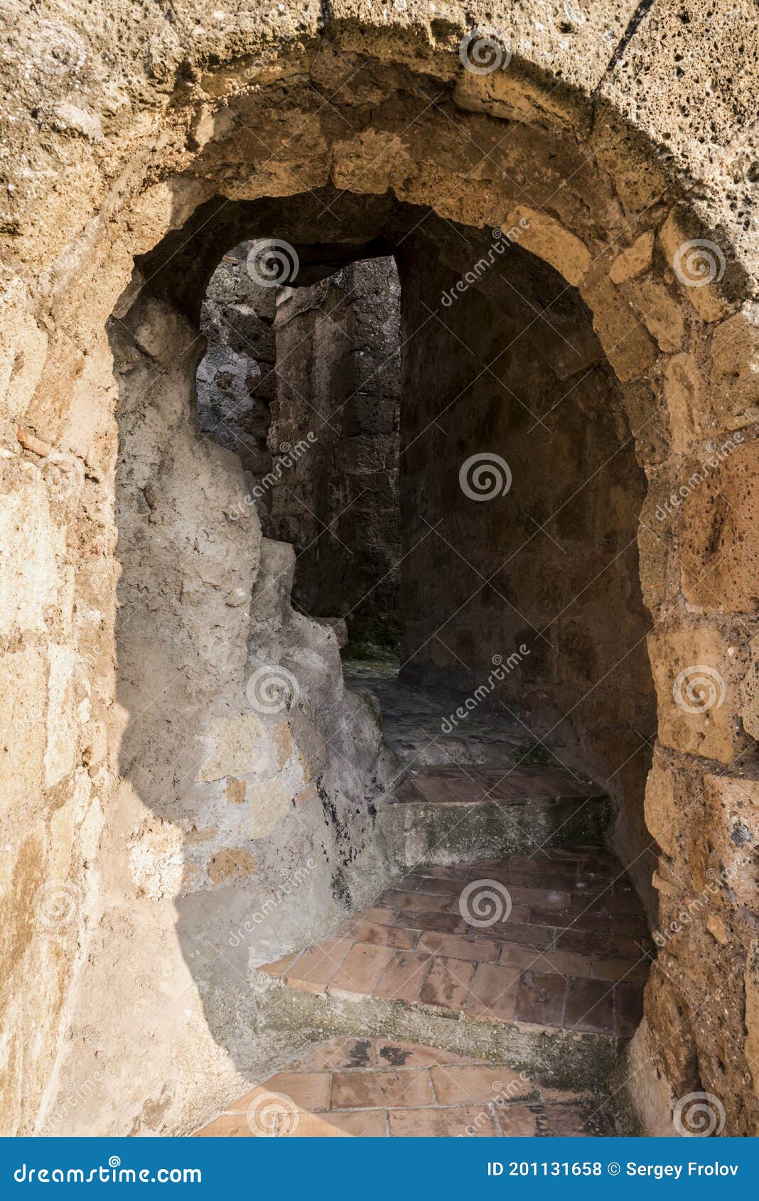 steps on a street made inside the mountain in the medieval commune town of calcata in italy