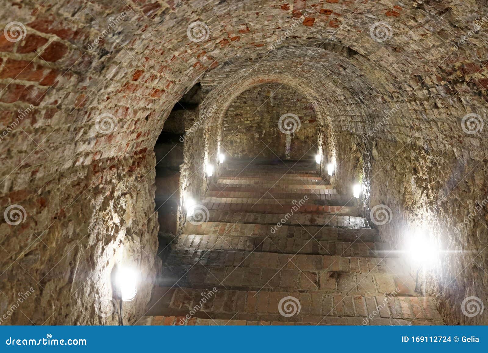 steps to the basement in the red stone castle near the settlement called pila in slovakia